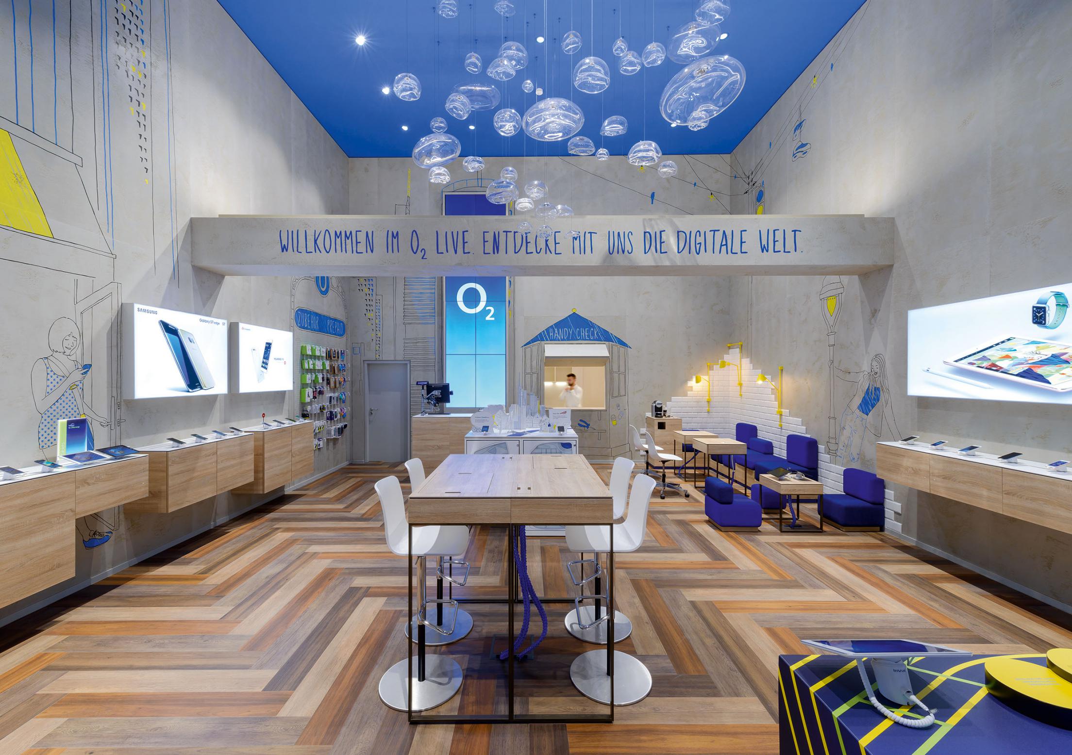 普陀區(qū)90平藍白色調手機營業(yè)廳辦公室裝修設計-第3張圖片-上海古都建筑設計集團